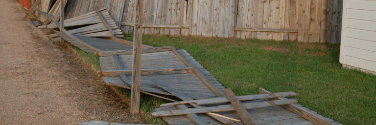 fence damaged by a storm