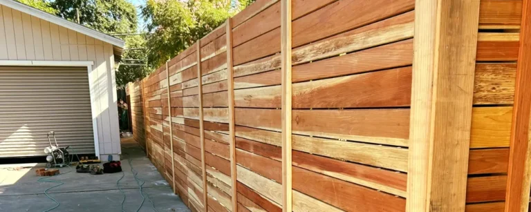 Sacramento custom redwood perimeter fence installation by Classic Fence Co