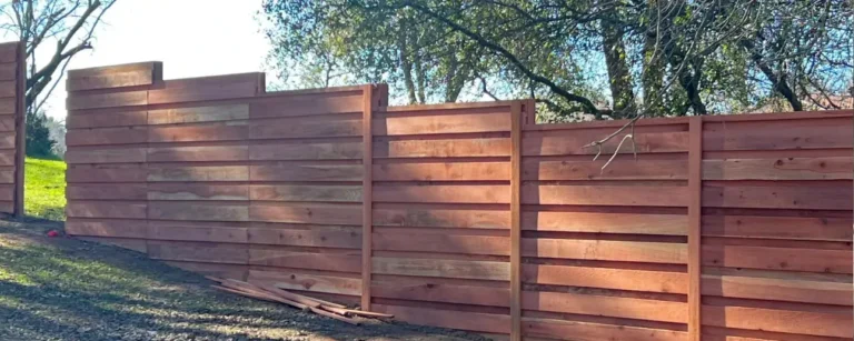 Sacramento redwood boundary fence installation by Classic Fence Co